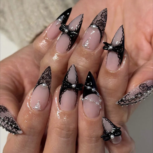24Pcs Medium Almond Press On Nails Nude with Black Lace Patterns, 3D Bow Charms & Pearl Accents, Glossy Reusable Acrylic False Nails Kit for Women Gothic Vintage Party Wear